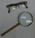 Barbara Leighton's Glasses and Magnifing Glass