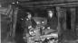 l-r: George Bouchard and Jimmy Mitchell running locomotive underground at the Jewel Mine