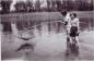 Sonja Parama (holding stick) and Marion Sereda fishing