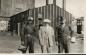Three men standing outside the Rosedale Mine