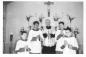 Father Joseph Turcotte and four altar boys