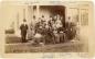 Photograph: Lady Alice Tilley, the Macdonalds and the Thompsons on a Verandah