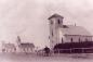 A photo of the Unversialist Church, the School house and the Catholic church, around 1910 to 1920.