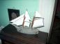 A wooden model of a ship from the home of Gilbert Seaman.