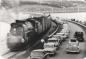 Train, cars and people after the official opening of the Canso Causeway on August 13th, 1955