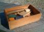Wooden box that held peg making articles. A common sight in many households years ago.