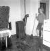 Mrs. Rowland cleaning up after 1964 tsunami
