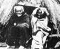 Native Couple in Bulrush Mat Shelter