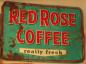 A sign for Red Rose Coffee