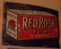 A sign for Red Rose Tea