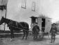 Samuel Hoover Byer Ramer and his son Ora delivering milk in Markham Village