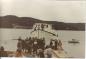 Bringing a boat back to the wharf after a launch at Herny Vokey's shipyard in Trinity, Newfoundland.