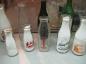 A variety of milk bottles made by the Wallaceburg glass industry over the years