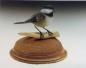 Black caped Chickadee Carved by Les Wilson