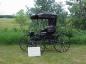 Jump Seat Buggy with a rare two ply top.  This buggy was used in the early 1900's.