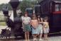 Denise, Anna Lisa, Laurissa and Valerie Thiessen as children going on a train ride.