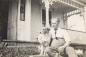 'Willie O' with his dog Scamp on the steps of the Mitchell and Hosking home