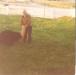 Rex Chaulk with Hilda Murray's dog in his back yard