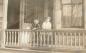 Aikenhead (on left) with his sister Audrey, on the porch of their grandparents' home