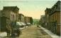 Postcard of the eastward view of Main Street in Coaticook