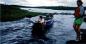 Students employed by the Indian Bay Ecosystem Corporation travelling in boat to conduct research