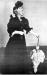 Winnifred Van Slyck wearing a black 'paper tafetta' dress, circa 1880.