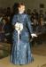 Fashion Review member Glenda Peterson wearing a taffeta wedding gown, circa 1878.