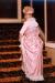 Fashion Review member Glenda Peterson modelling pink satin ball gown.