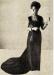 Purple silk velvel evening gown worn by an unidentified Fashion Review model.