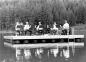 Musicians perform on the floating dock on Lost Lake.