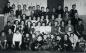 Group school picture of students who had to attend school at the National Hall in Redwater.