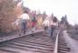 Children walk the Canadian National Railway track