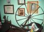 This spinning wheel was located in the home of Gilbert Seaman, in Minudie, Nova Scotia.