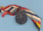 Reverse of Andrew "Beef" Malcolm's 1920 N.B. "Y" Senior Swim Championship Medal