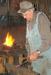 Photograph of William Moreau, blacksmith of New Richmond, taken in his shop in Oct. 2004 