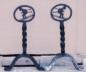 Custom made andirons, made by Warren Gilker in his blacksmith shop and shipped to Switzerland