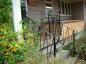 The front porch railing of J. A. (Bud) Campbell's home, made by Warren Gilker in his blacksmith shop