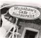 Hanging of the Munshaw Cafe Restaurant Sign