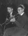 Young Dash and Rick Wertman playing a duet at a synagogue function