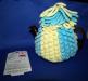 Blue and yellow crocheted teapot cover