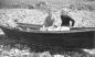 Sitting in a punt on the beach made by Everett's father, Murray at Western Light, Brier Island.