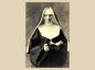 Sister Saint-Jean-Baptiste, Superior (Dmerise Martel)