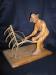 Man with cradle, carved by Abe Patterson
