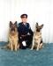 Cst. R. Geick with Bear and Max of the Greater Sudbury Police Service's Canine Unit