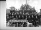 Crew of HMCS Saskatoon pose for publicity photo on ships deck.