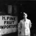 Louis Fine at entrance to H. Fine and Sons, wholesale supplier of fruits and groceries