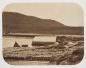 Temporary fish warehouses and drying flakes Crouse/Cape Rouge, Newfoundland (ca. 1857-1859)