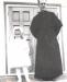 Thelma Benoit with Father Ryan the day of her First Holy Communion (1960)